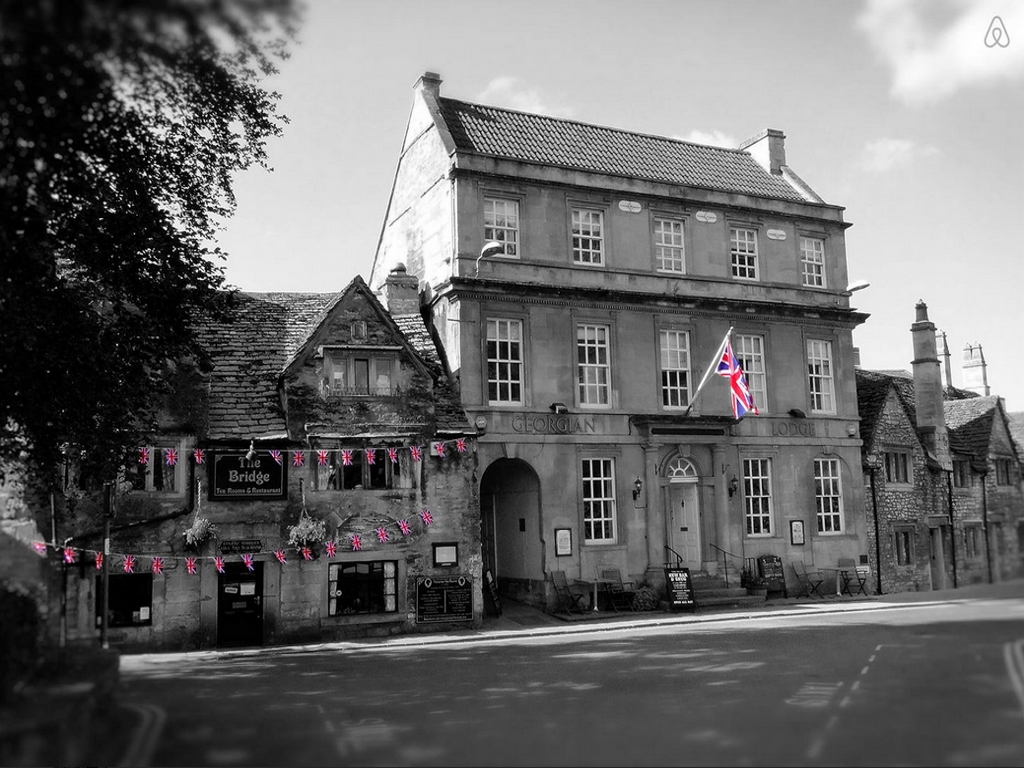 A black and white image of the outside of the Georgian Lodge.